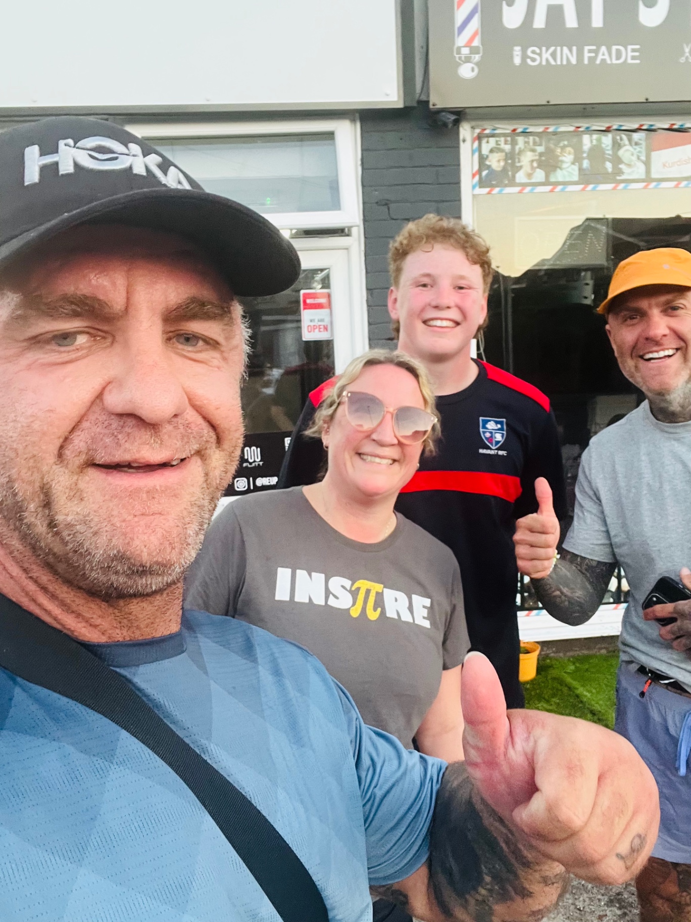 Rob with supporters outside a shop on a 4x4x72 run, June 2026